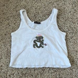 cropped white dragon tank top from brandy melville